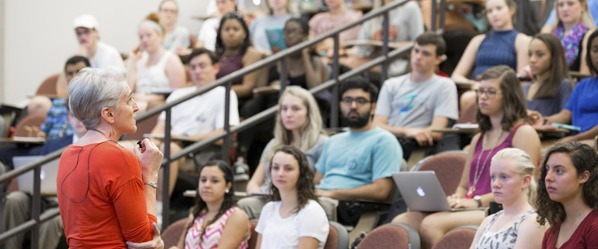 Marguerite (Peggy) Brickman teaches an auditorium classroom on the first day of Fall semester.